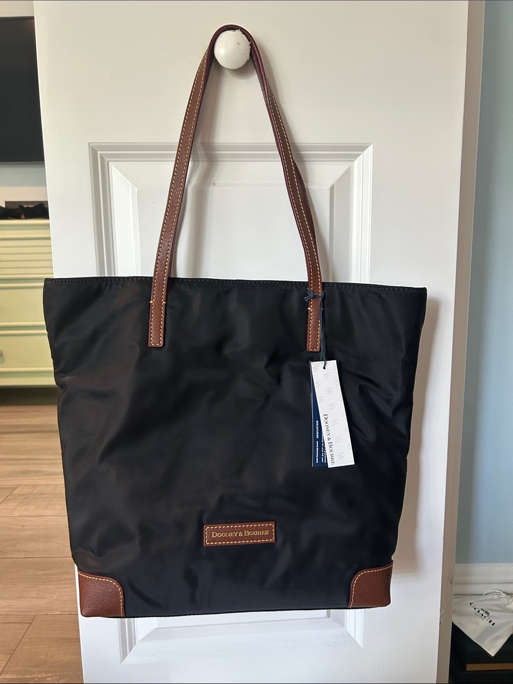 Dooney & Bourke Black Nylon Messenger Tote with Brown Leather Trim
